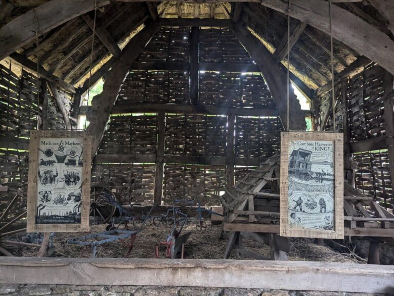 boards hanging from barn beams with images and information history of threshing