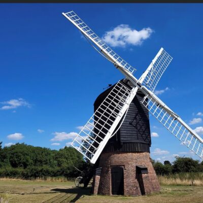 windmill on blue sky backgroun