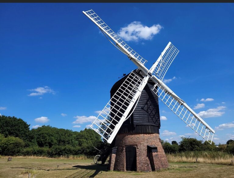 windmill on blue sky backgroun