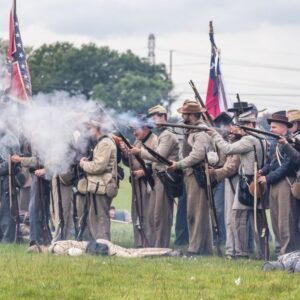 American civil war society re-enactment society firing guns.